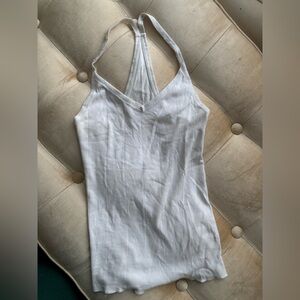 Out from under white tank top SZ s